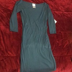 Long sleeve cross front dress.